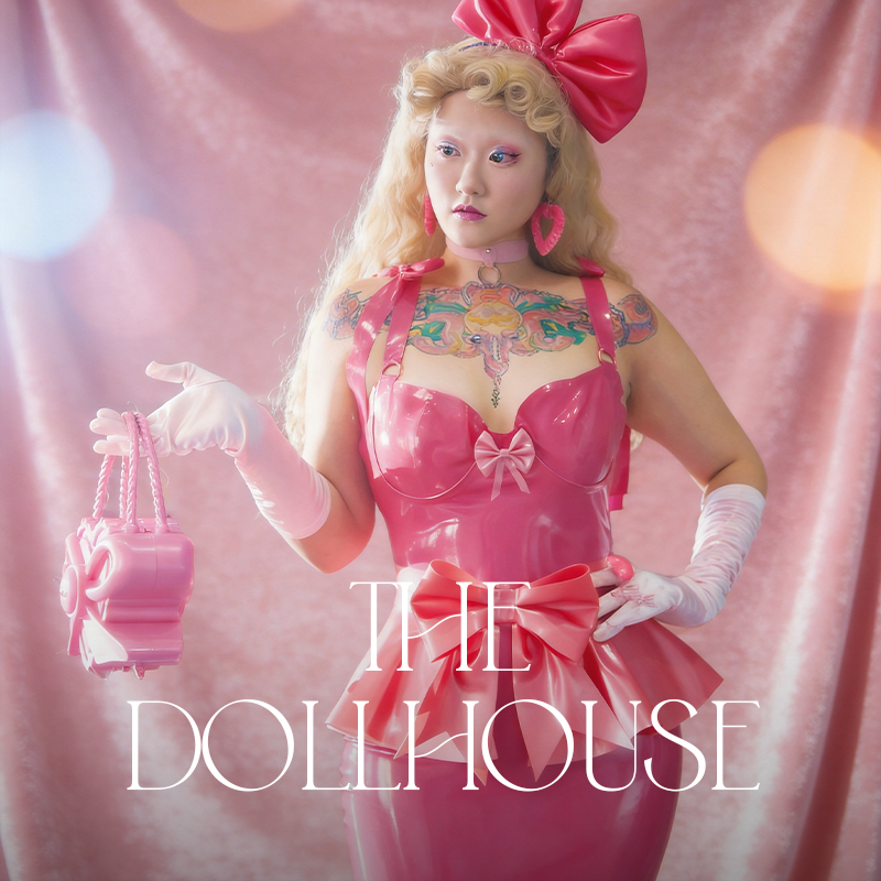 Ribcage Latex The Dollhouse Collection cover showcasing architectural latex design, signature bow detailing, and a dangerously sweet doll aesthetic.