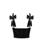 A high-shine black latex bustier by Ribcage, featuring structured cups, front criss-cross ties, shoulder straps decorated with large bows at the back, and a back zipper closure, designed with a compressive second-skin fit.