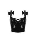 A high-shine black latex bustier by Ribcage, featuring structured cups, front criss-cross ties, shoulder straps decorated with large bows at the back, and a back zipper closure, designed with a compressive second-skin fit.
