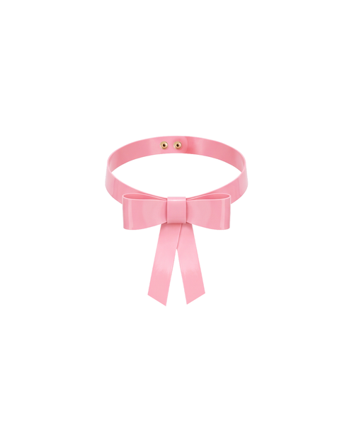 A front view of the high-shine metallic pink latex bow choker by Ribcage, featuring a sleek collar band, a structured front bow, and elegant dangling ribbon ends, displayed on a clean white background.