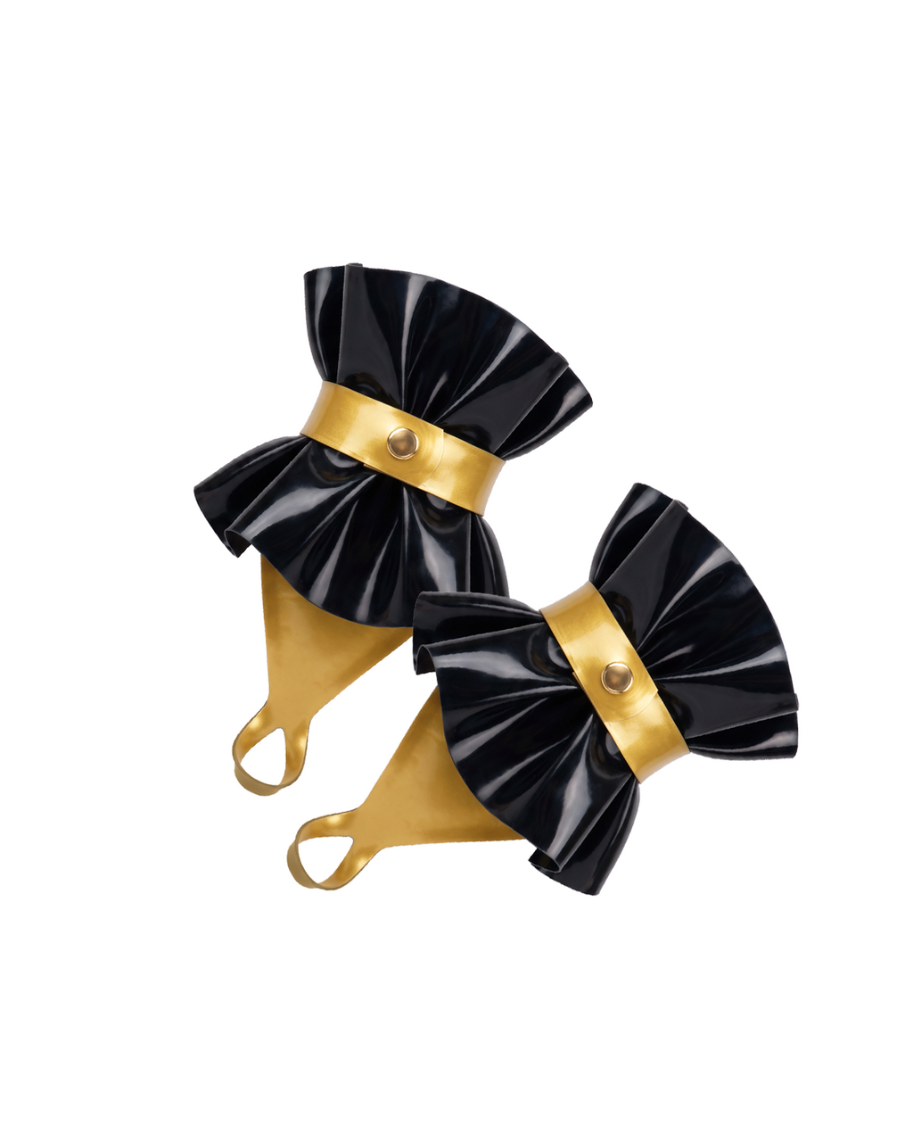 A pair of high-shine metallic gold and black latex hand cuffs by Ribcage, featuring a flared ruffled cuff design, a contrasting metallic pink bow, and an integrated finger loop.