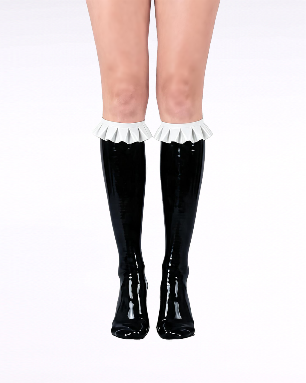 A front view of a model's legs wearing high-shine black latex knee-high socks by Ribcage, featuring contrasting white ruffled trims at the cuffs and a seamless, second-skin fit.