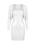 A high-shine white latex two-piece ensemble by Ribcage, featuring a minimalist spaghetti strap cami dress and a structured long-sleeve bolero, designed with a compressive second-skin fit.