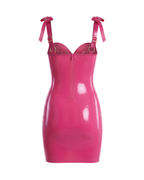 A back view of the high-shine vivid fuchsia latex bodycon slip dress by Ribcage, featuring a full-length back zipper closure and metallic pink structural bows on the shoulder straps, displayed on a clean white background.
