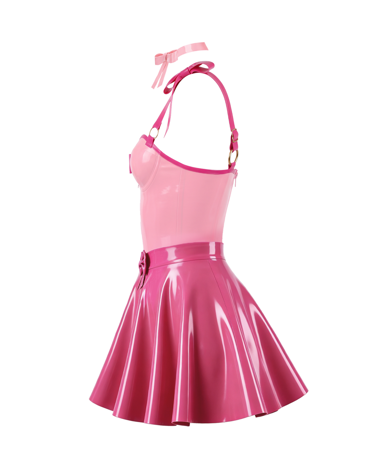 A side view of the high-shine two-tone pink latex three-piece ensemble by Ribcage, highlighting the metallic pink Fondant Bodysuit, the vivid fuchsia high-waisted Fondant Skirt, and the matching metallic pink Eloise Bow Choker.