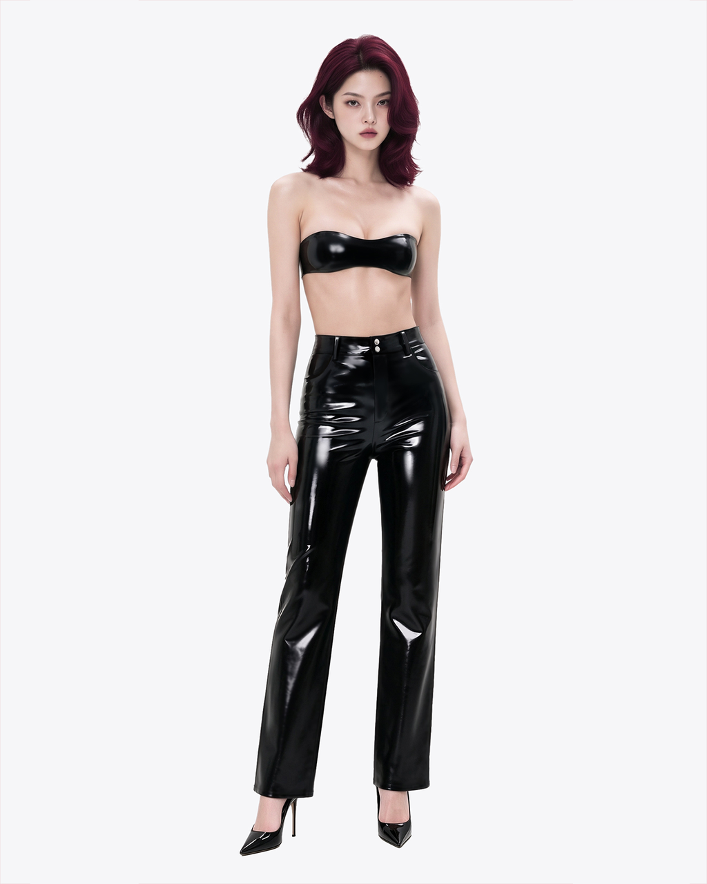 A full-body view of a model wearing the high-shine black latex Phantom Straight-Leg Trousers by Ribcage, showcasing the sharply tailored silhouette and sculptural drape.