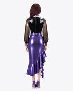 A back view of a model wearing the metallic purple and black latex Ripple Suit by Ribcage, highlighting the semi-transparent balloon sleeves, back zipper closure, and the cascading flounce skirt hem.