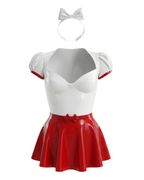 A front view of the high-shine white and red latex dress by Ribcage, displaying a white top with a sweetheart neckline and red trim on the puff sleeves, a matching high-waisted flared red mini skirt with a front bow, and a white bow headband placed above the top.