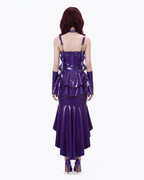 A model shown from the back wearing a high-shine purple latex multi-piece suit by Ribcage, featuring a form-fitting dress layered with the modular metallic purple Aurora Peplum Overlay, a matching choker, and coordinating long gloves.