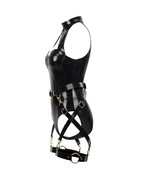 A glossy black latex multi-piece suit by Ribcage, featuring a halter-neck The Eclipsed Bodysuit and the modular Eclipse Harness Set with leg garters and metallic hardware.