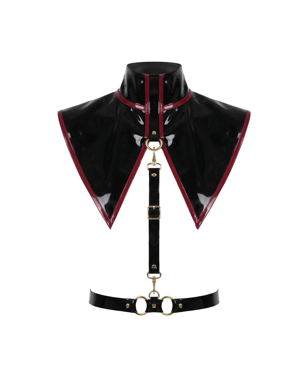 A glossy black latex modular capelet harness set by Ribcage, featuring a high-neck triangular capelet with contrast red trim, a vertical chest strap, and a waist belt with metallic O-rings.