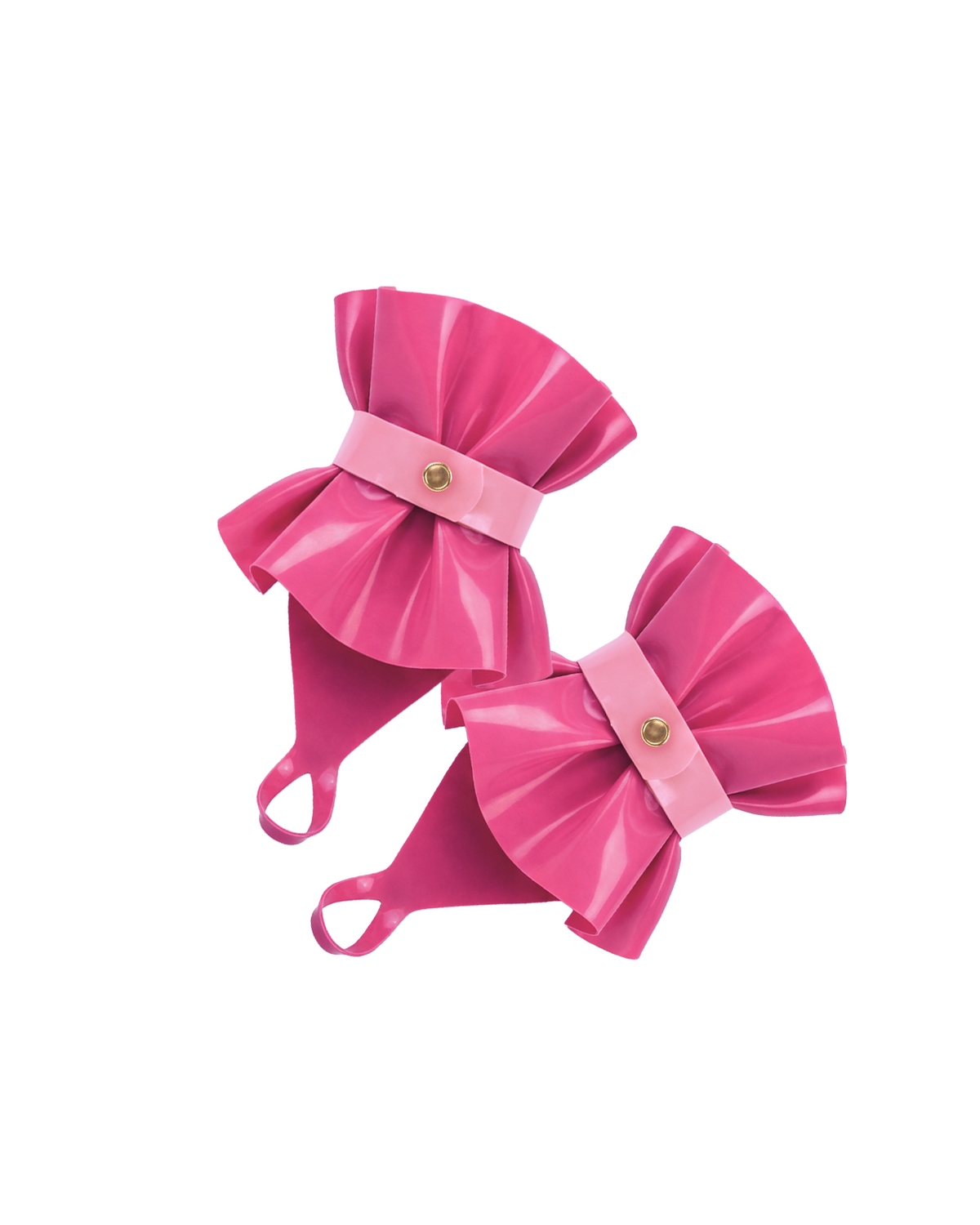 A pair of high-shine vivid fuchsia latex hand cuffs by Ribcage, featuring a flared ruffled cuff design, a contrasting metallic pink bow, and an integrated finger loop.